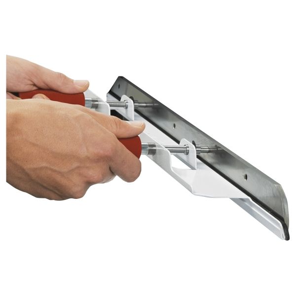 Dispositif de changement de lame pour massicots