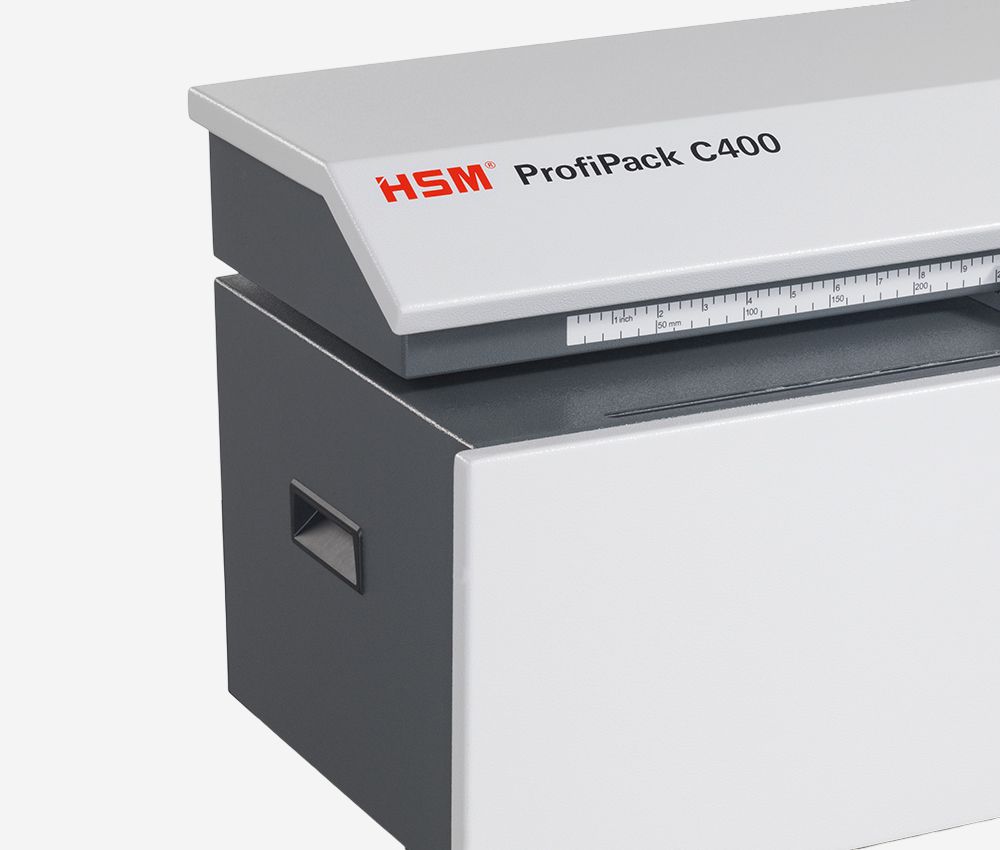 Poignées encastrées latérales du matelasseur de cartons pour calage HSM C400 ProfiPack